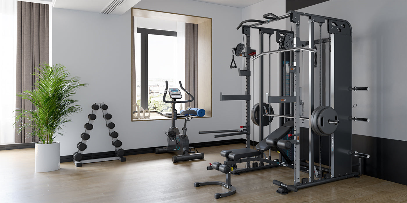 Gym room with full of Fitway equipment, dumbbells, and a mirror on the wall.
