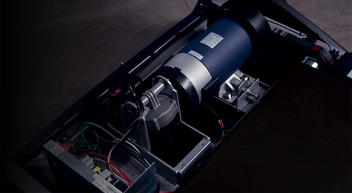Close-up of a mechanical component inside a device on a dark background