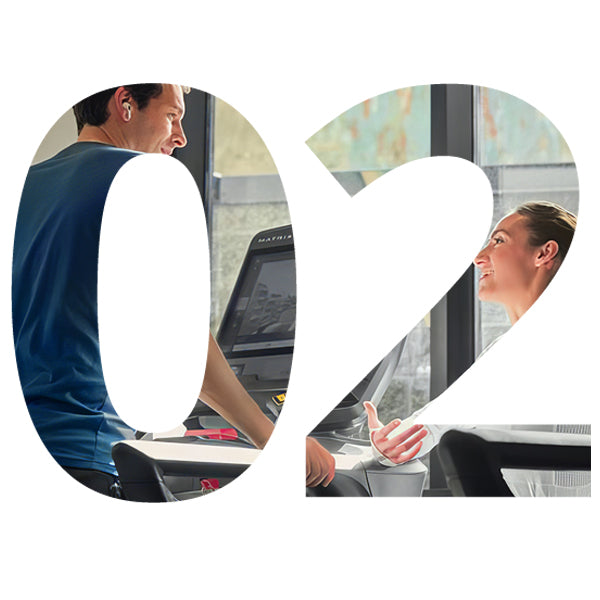 Two people interacting in a modern office setting with large '02' overlay.