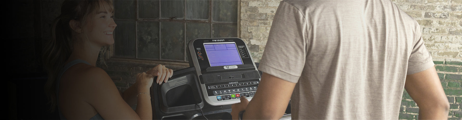 Person using a treadmill in a tiled room