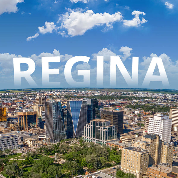 Cityscape with 'REGINA' text overlay against a blue sky with clouds.