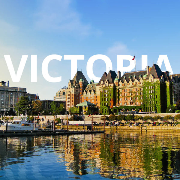 Cityscape of Victoria with prominent buildings and 'Victoria' text overlay.