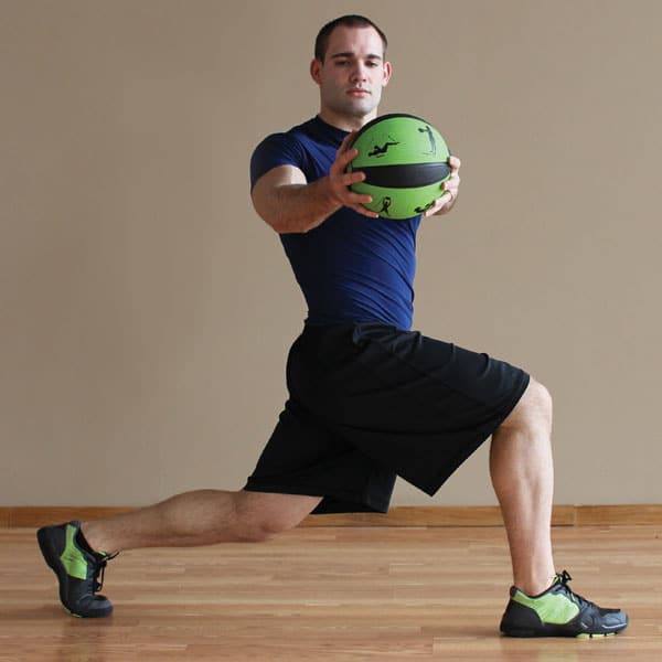 Prism Fitness Smart Medicine Ball - 6lb Orange view in use | Fitness Experience 